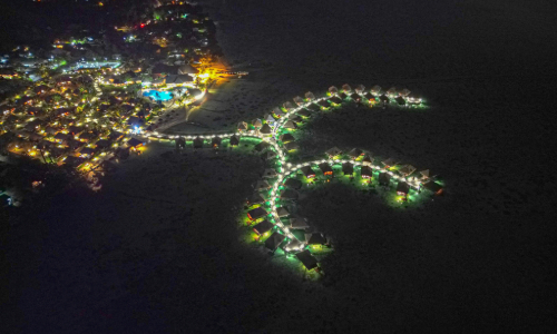 Artificial light on a coral reef in French Polynesia